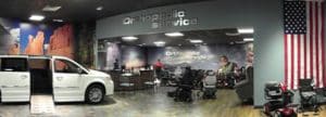 Orthopedic Service showroom with mobility van, scooters and power wheelchair