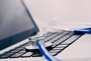 Stethoscope on laptop keyboard